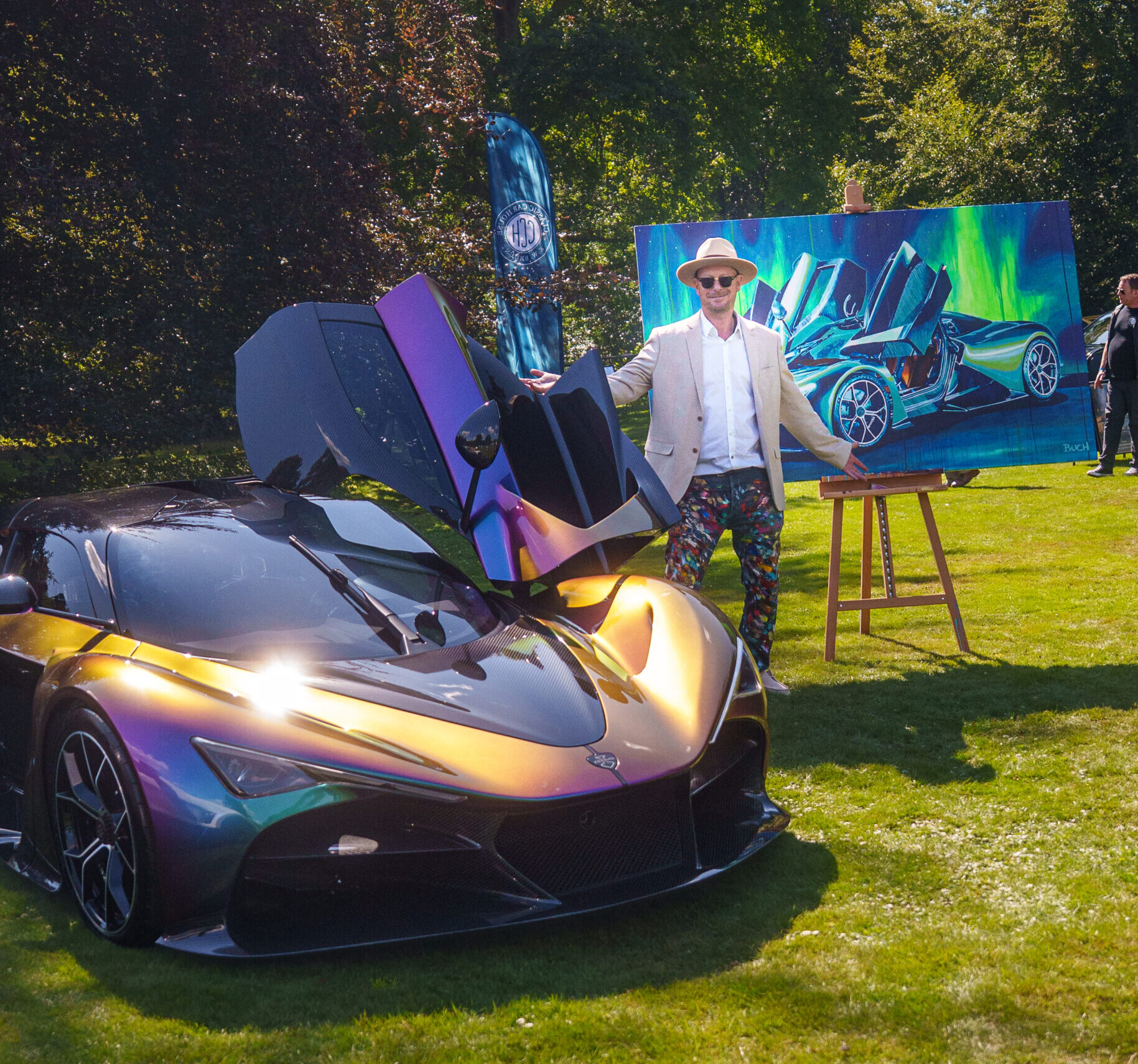 Artist Allan Buch with the Large scale automotive painting of the Zenvo Aurora Tur 120 x 200 cm